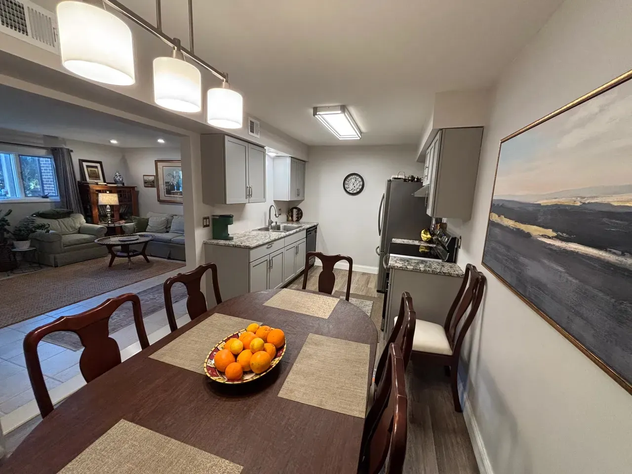 Renovated condo dining area open to the kitchen