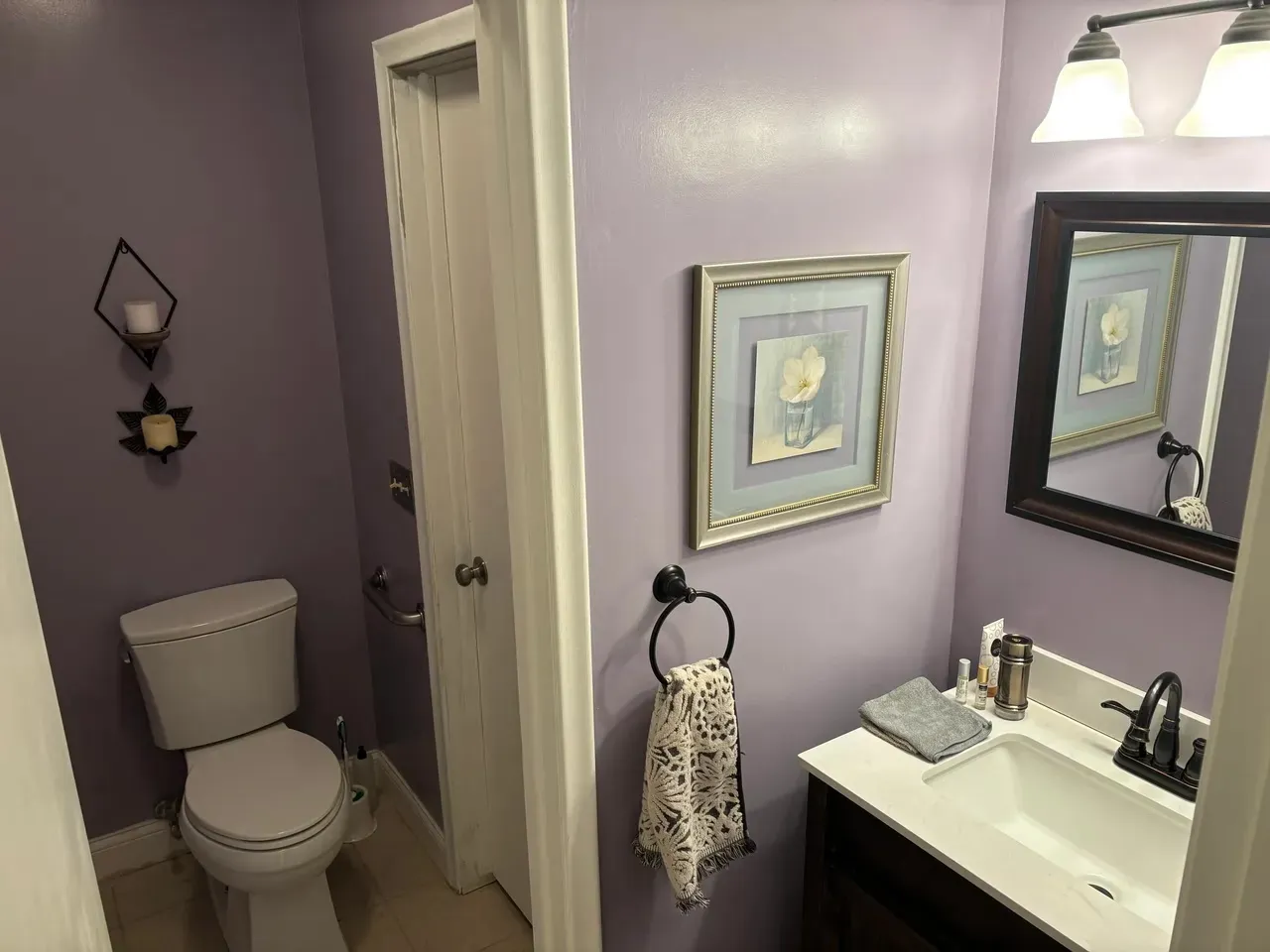 Renovated condo half bath with new vanity and fixtures
