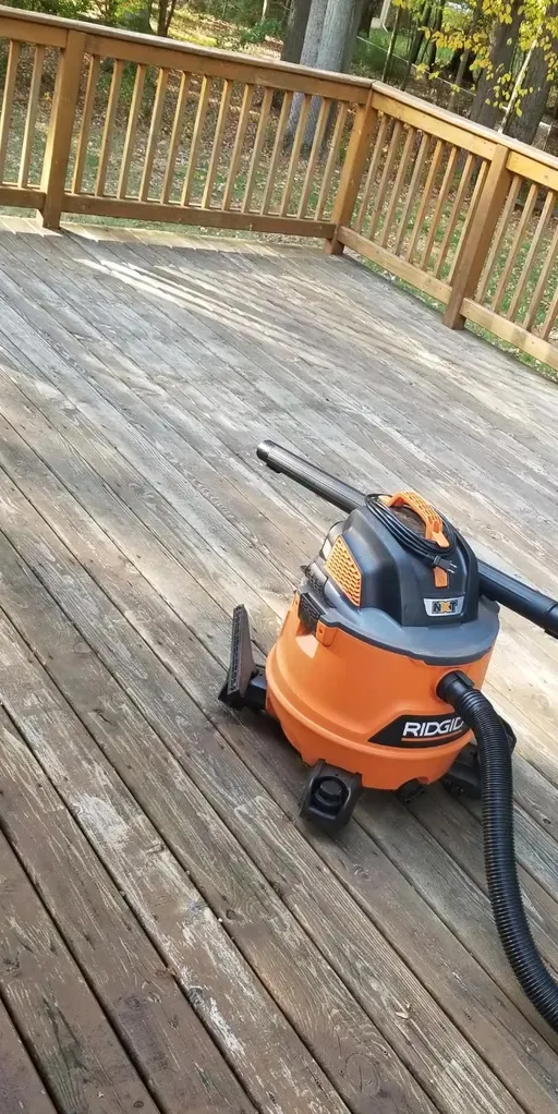 Weathered wood deck before restoration