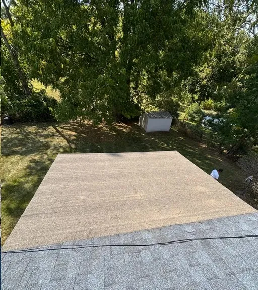 Low-slope roof section after repair